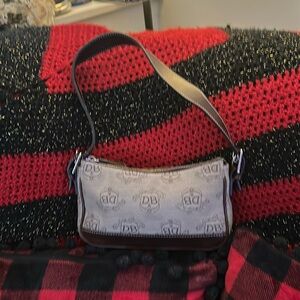 Dooney & Bourke Small Handbag tan with brown leather trim and strap  EUC